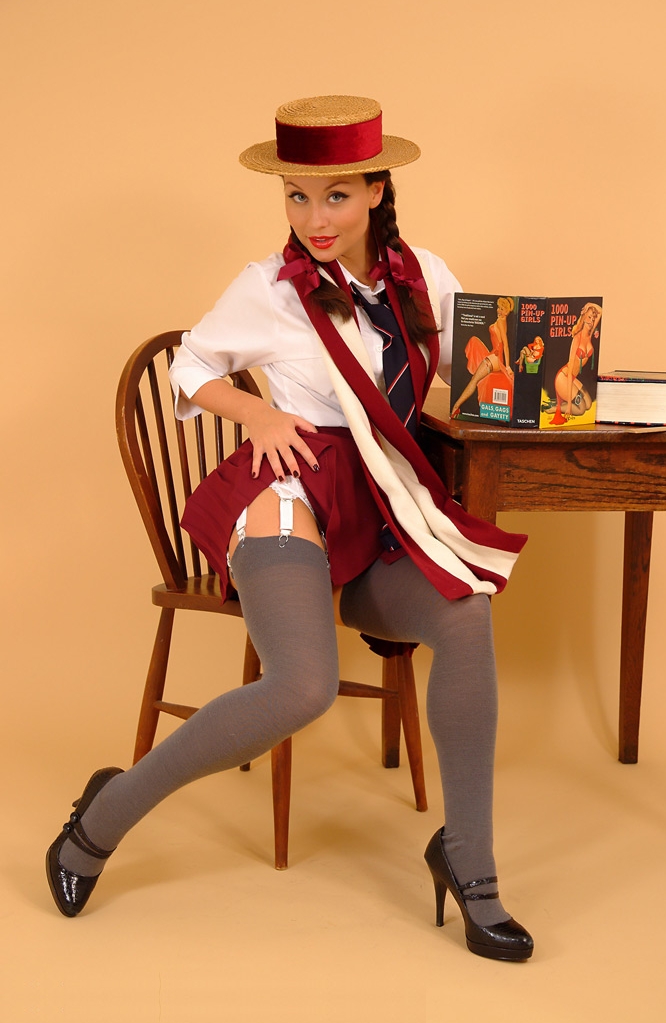 Brunette Schoolgirl wearing Grey Opaque Stockings and Red Pleated Miniskirt